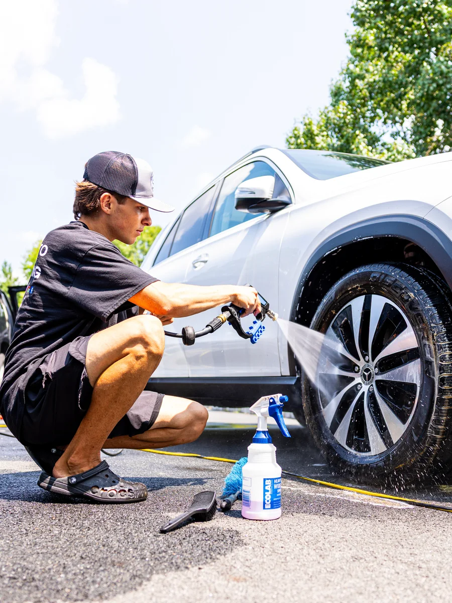 Pre-rinse pressure wash during exterior car detailing in NJ