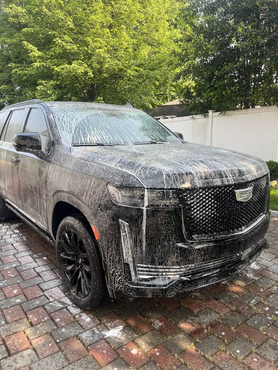Foam cannon pre-soak during mobile exterior detail in Morris County NJ