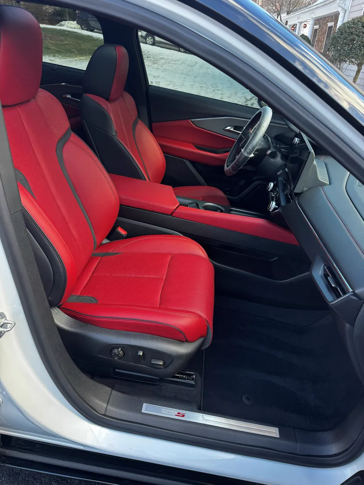 Acura red leather front seats after an interior detail