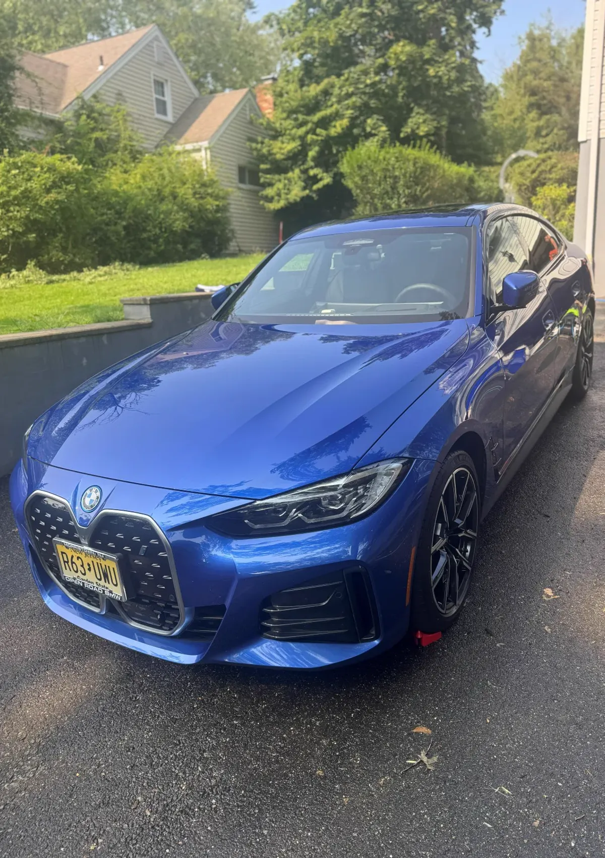 Blue BMW 4 Series with a glossy finish after an exterior detail in Morris County NJ