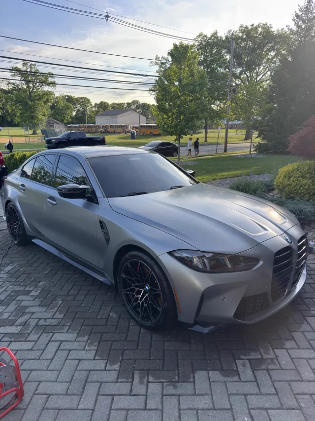 Matte silver BMW M3 after an exterior detail, hand washed with no swirl-inducing brushes