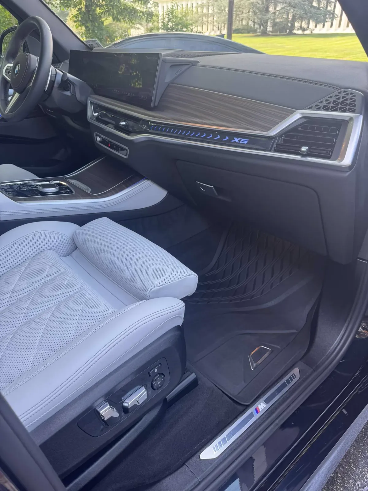 BMW white leather seats and dash after an interior detail