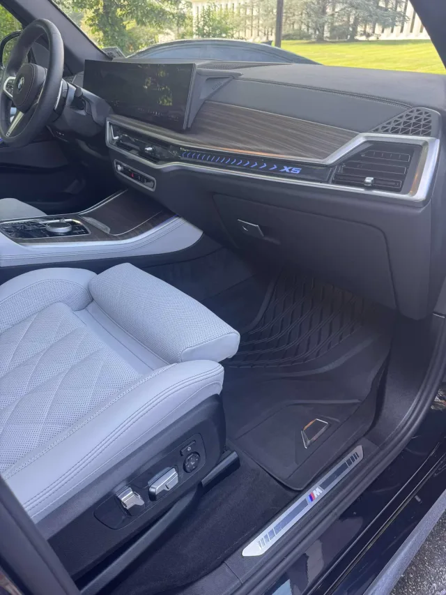 White leather front seat and dashboard after an interior detail
