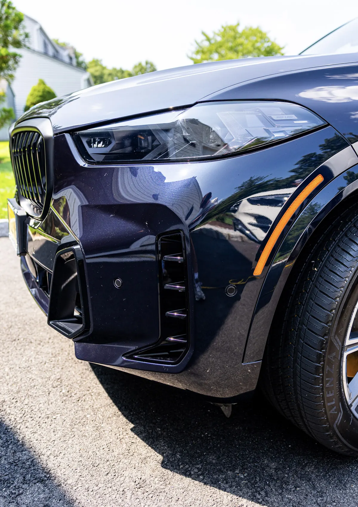 Dark blue BMW SUV after a hand wash and exterior detail