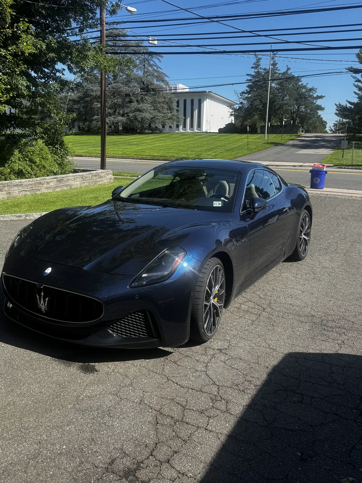 Dark blue Maserati GranTurismo after an exterior detail